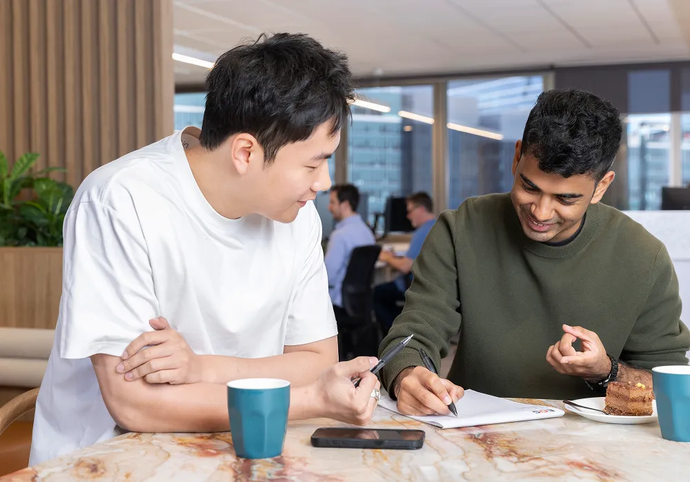 A Sope consultant discussing a Microsoft 365 project with a client